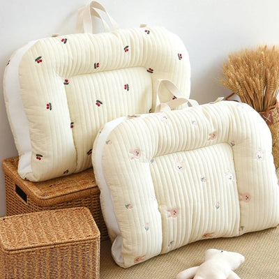 Deux bebe cocon cocoon zen mise en avant plié en deux pour déplacement facile.