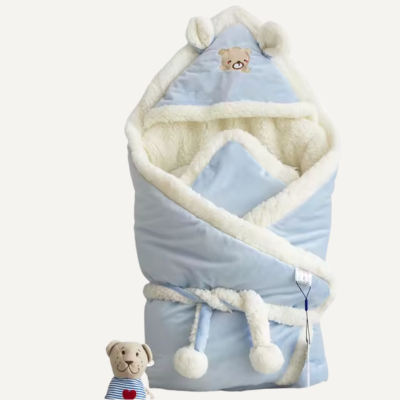 Nid d'ange bebe Cocon nuageux bleu déposé sur un fond blanc.