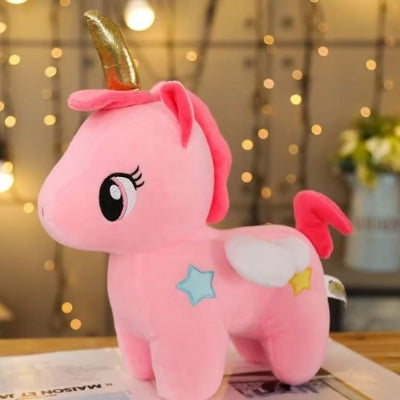 Peluche licorne MagicSoft - corne scintillante dorée et crinière multicolore au toucher soyeux
