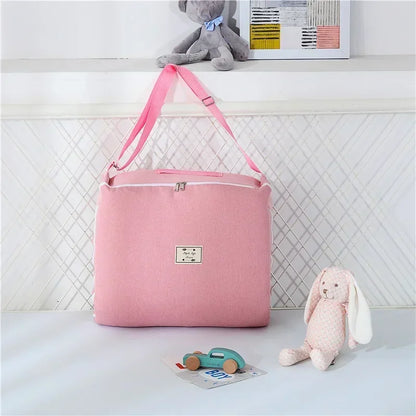 réducteur-de-lit-bébé-transportable